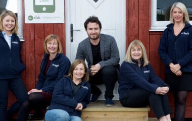 CR Smith staff members taking part in Sleep in the Park. Photographed with Josh Littlejohn MBE.