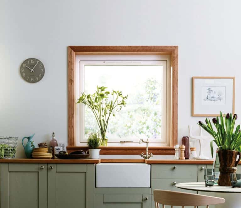 Kitchen scene with reversible window with American cherry timber sills and surrounds.