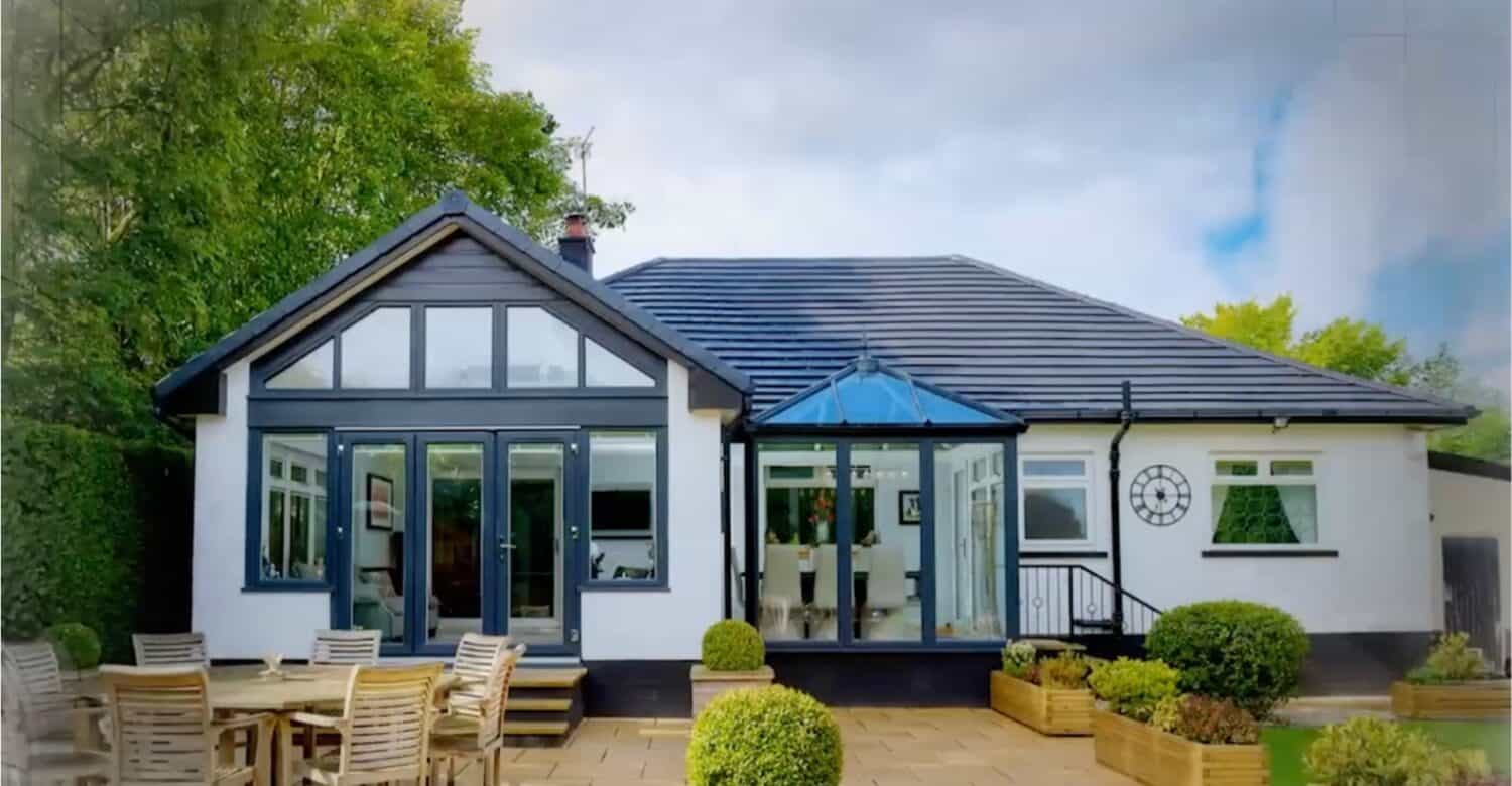 External image of Lorimer living space combining a solid roof and a glass roof sunroom