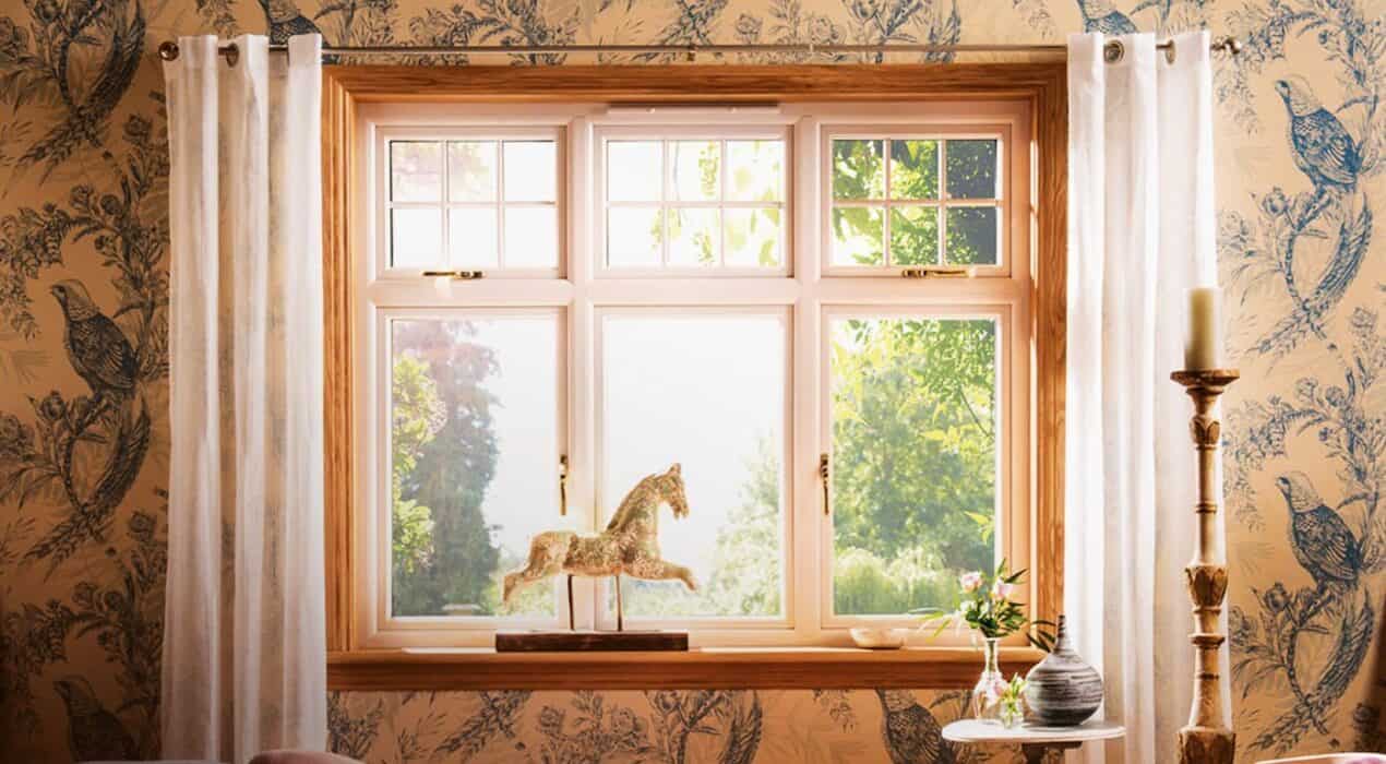 Bedroom scene with large casement window with royal oak timber sills and surrounds