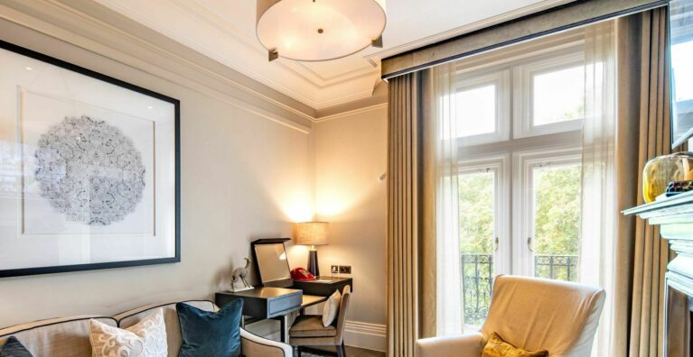 living room with secondary glazing fitted on the doors and windows