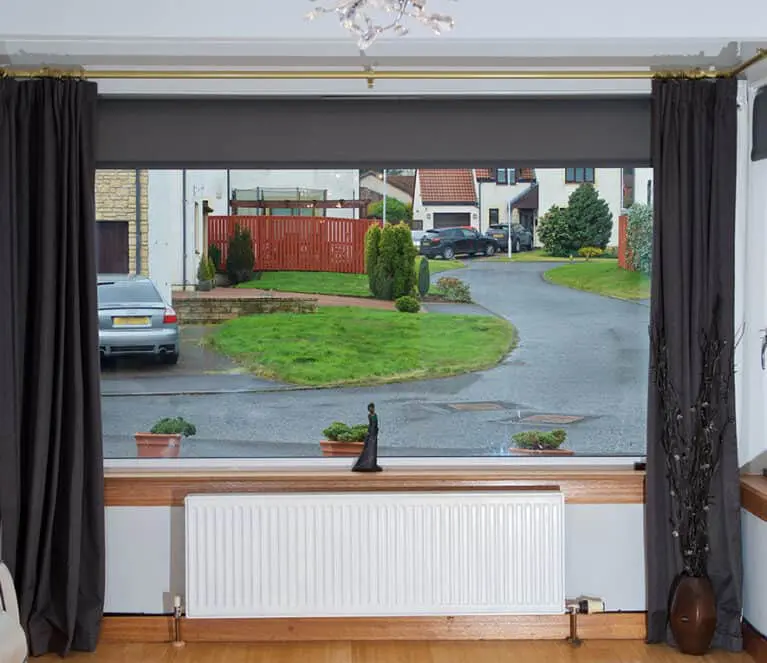 Fixed window with white internal surrounds, complete with oak sill