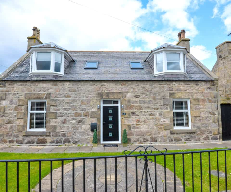 A single storey home with an attic conversion located in Peterhead, Aberdeenshire. With white upvc double-glazed windows and black composite door.