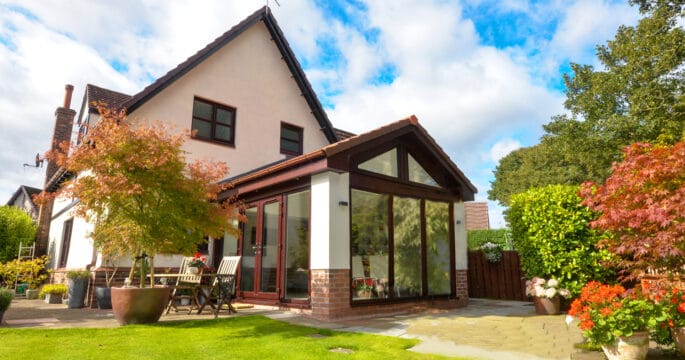 External view of gable ended tiled sunroom from the garden