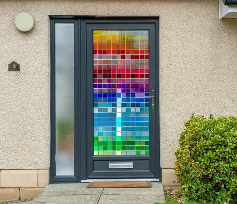 External view of anthracite grey uPVC door with multicolour stained glass design