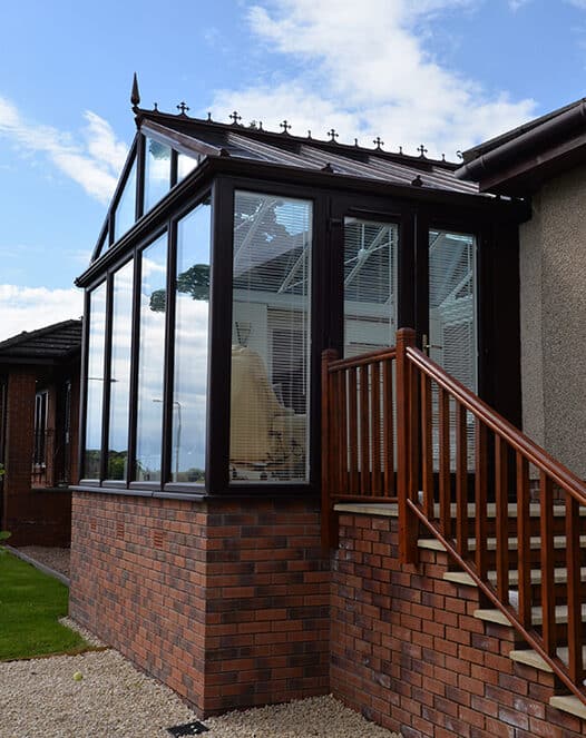 Gable front rosewood conservatory with smartglass roof