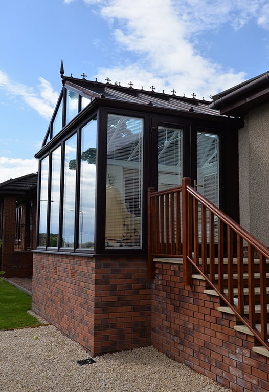 Gable front rosewood conservatory with smartglass roof