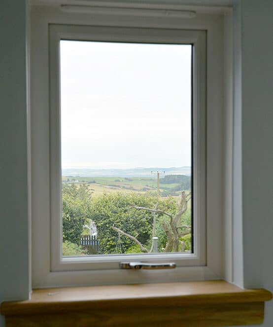 White casement window with royal oak timber sill