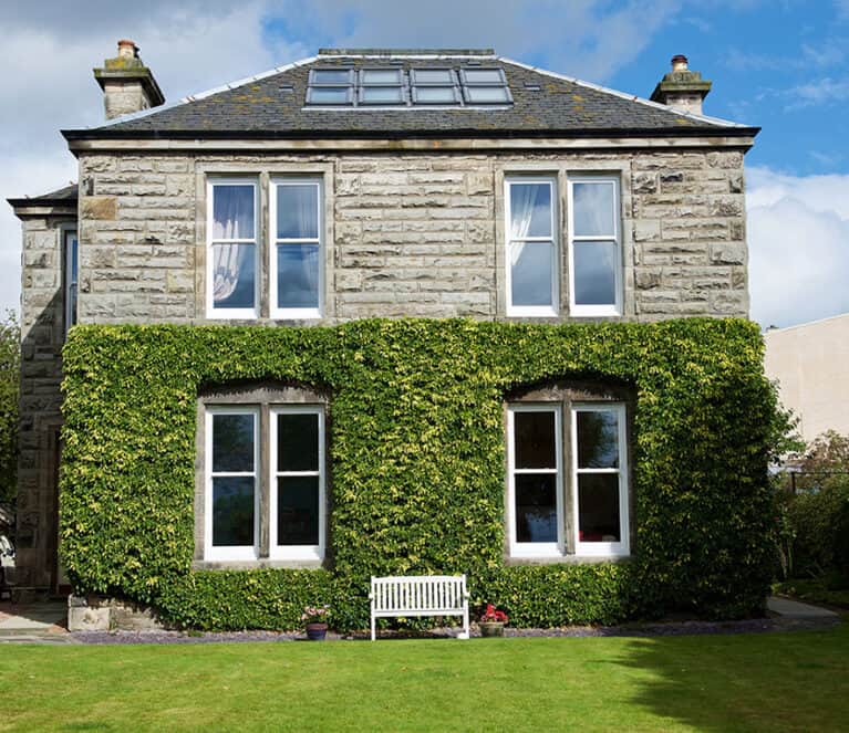 External view from the garden of victorian property with new sliding sash windows