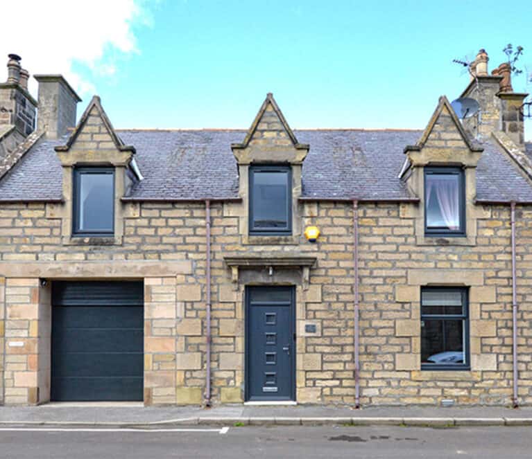 External view of Aberdeenshire property with anthracite grey windows and front door