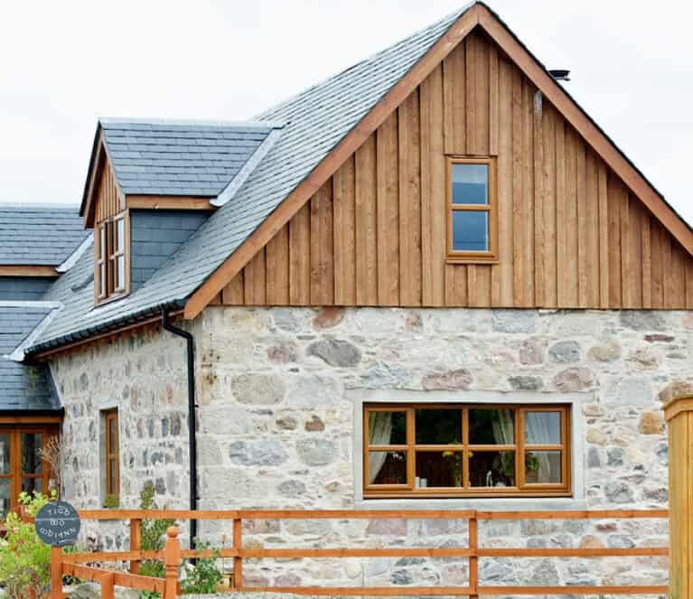 External view of inverness-shire home with american light oak windows