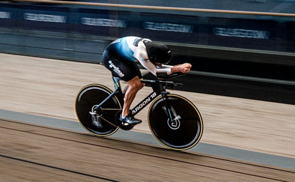 Photo of track cyclist Kyle Gordon on the track at the Glasgow velodrome
