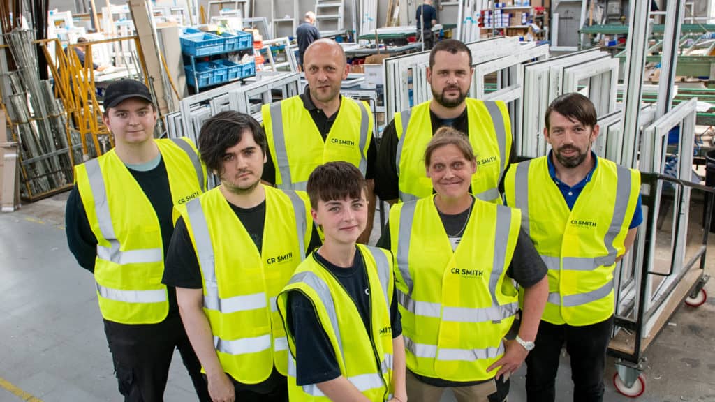Photo of new staff members at the CR Smith manufacturing plant