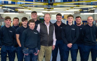 Photo of CR Smith apprentices with chairman Gerard Eadie