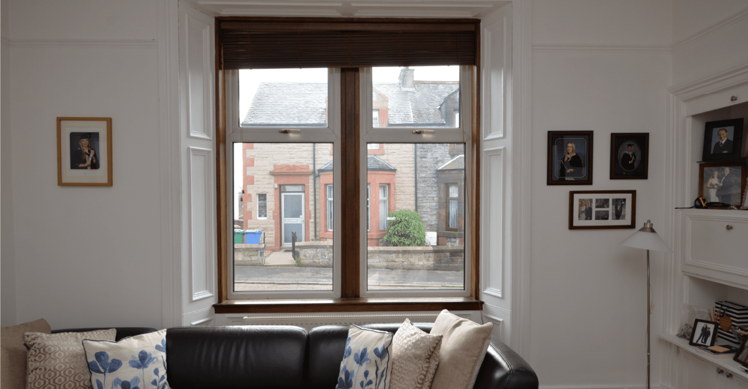 Before photo of an old double glazed window in a living room