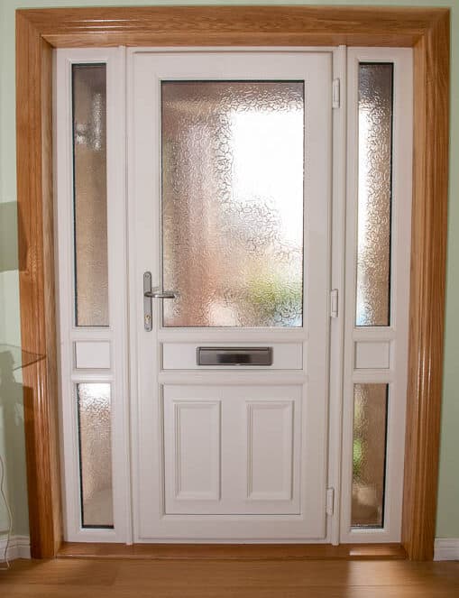 Internal view of white upvc front door with two glazed side panels