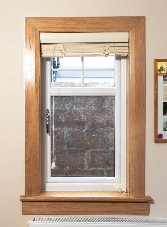 White casement window with royal oak timber sills and surrounds