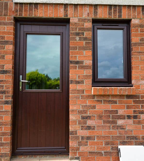 External view of rosewood back door and casement window