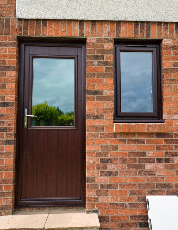 External view of rosewood back door and casement window