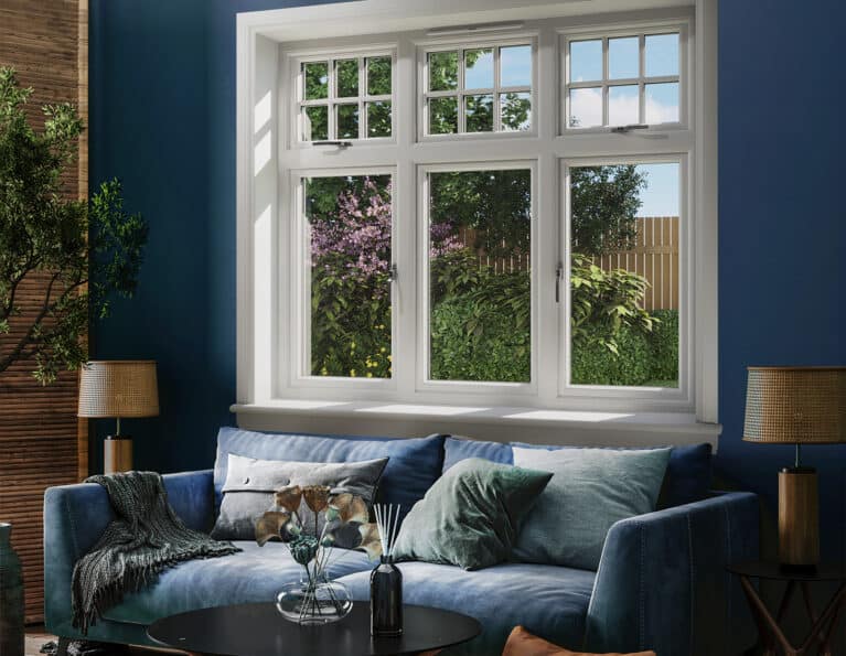 Blue living room with white 3 part casement window with white sills and surrounds