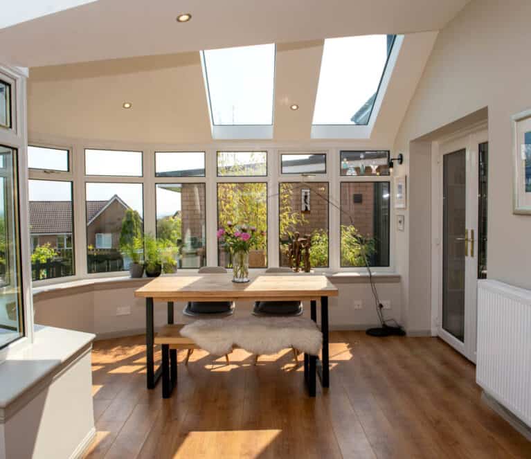 Internal view of conservatory with new solid roof and glazed roof panels