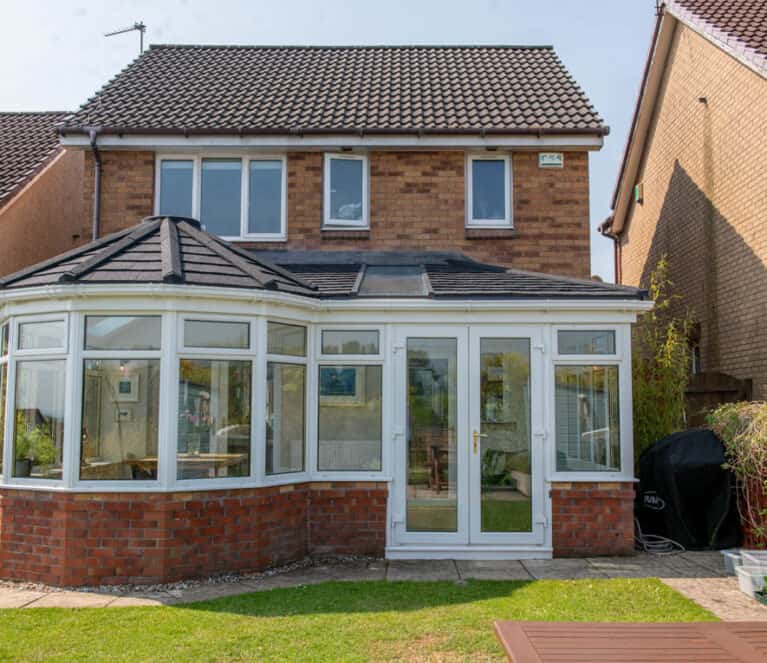 External view of conservatory with new solid roof