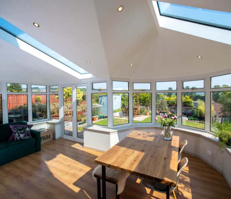 Internal view of conservatory with new solid roof and glazed roof panels