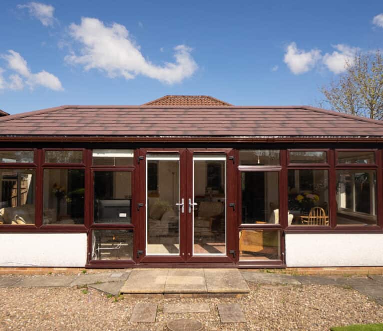 External view of conservatory with new solid roof replacement