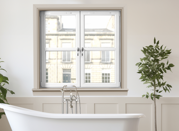 Bath under window overlooking Scottish architecture.