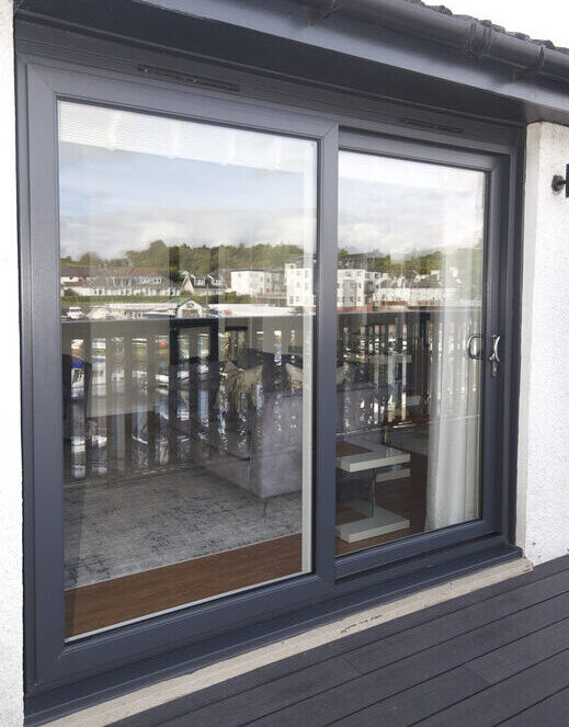 Anthracite grey patio door complete with chrome handles.