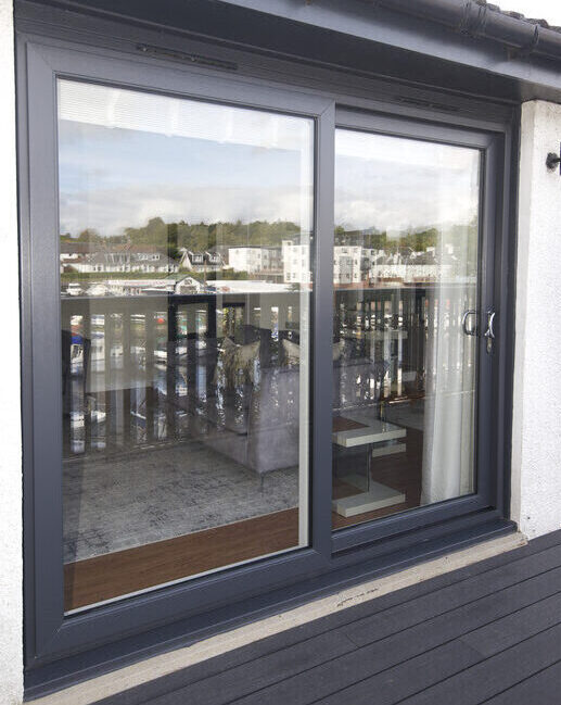Anthracite grey patio door complete with chrome handles.