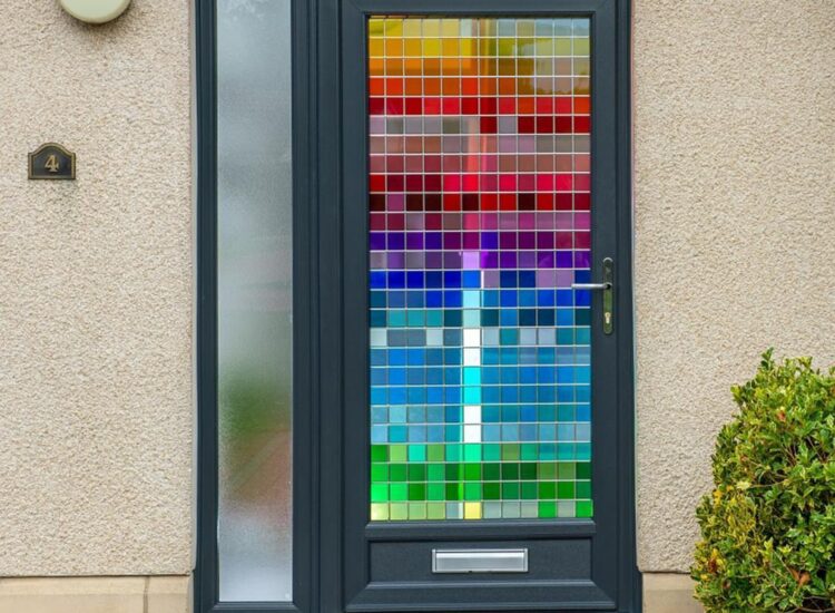 Bespoke stained glass design from CR Smith showcasing a mosaic effect of rainbow colours.