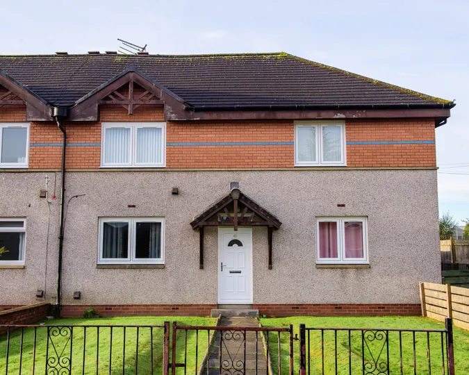 Upgraded Clydebank home with new white reversible windows and Georgian PVC door by CR Smith.