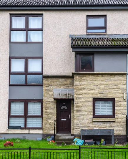 Rosewood reversible Georgian PVCu windows by CR Smith for Wellhouse Housing Association
