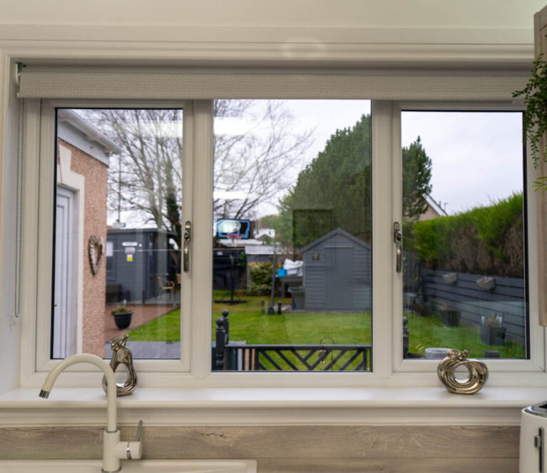Interior view of white Lorimer casement windows installed in a kitchen in a home in Wishaw.