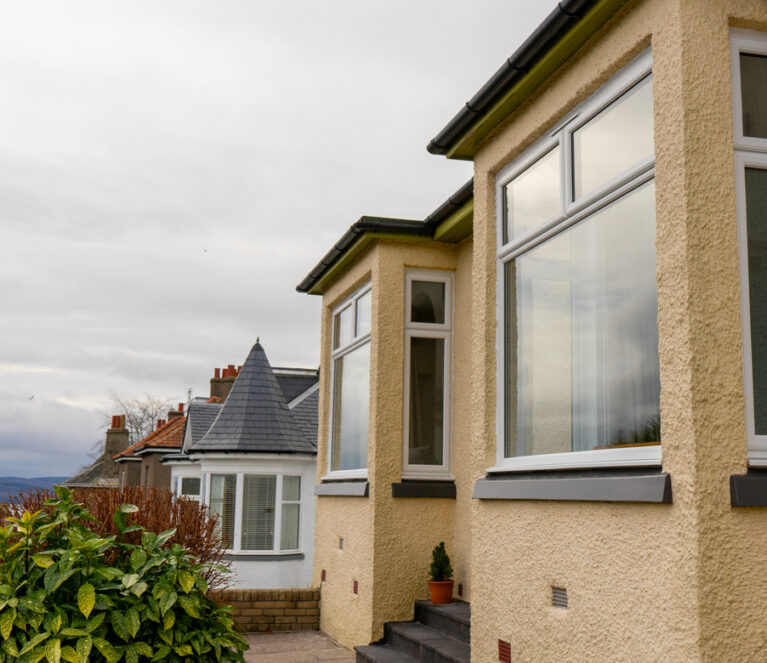 Exterior view of white Lorimer Casement Windows installed in Dundee