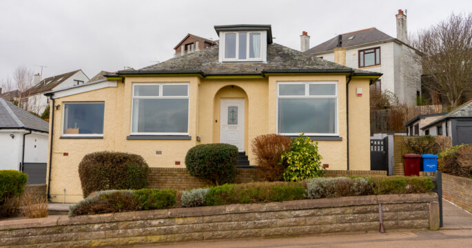 Exterior view of a full house fitted with white Lorimer casement windows in Dundee.