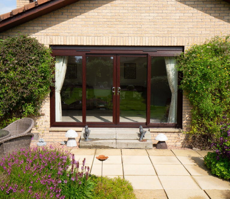 Rosewood Lorimer patio doors installed in a home in Doune