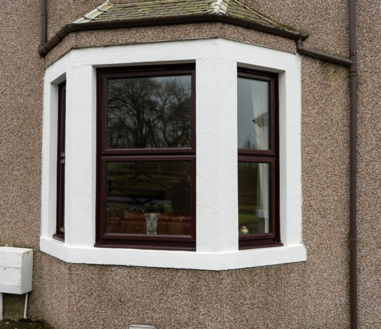 Exterior view of rosewood Lorimer casement windows installed in Fife.