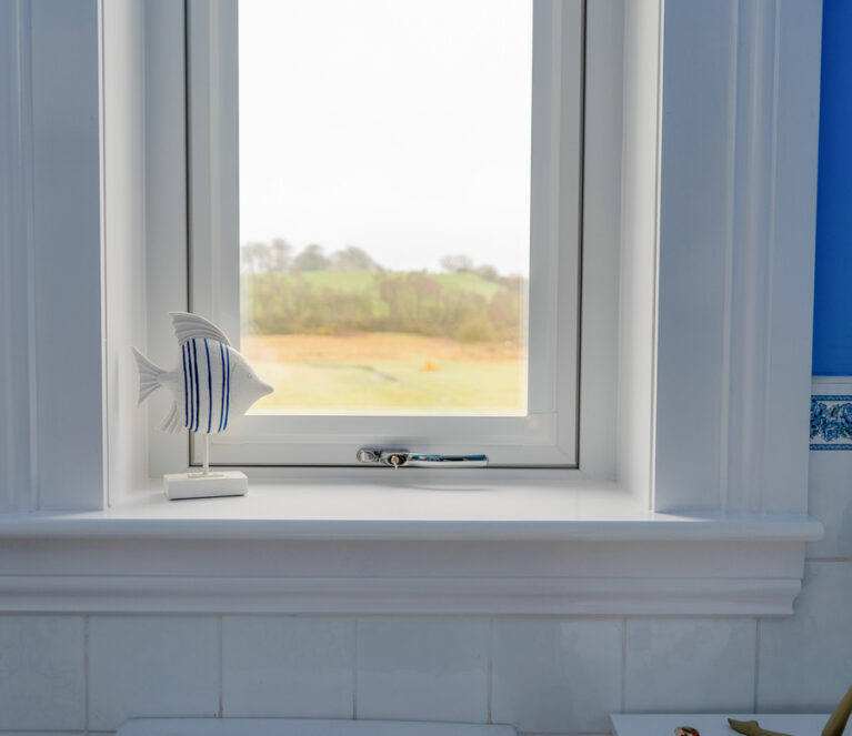 Interior view of a white Lorimer casment window installed in a bathroom in Fife
