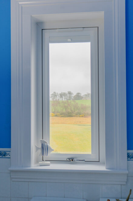 Interior view of white Lorimer casement window installed in a bathroom in Fife.