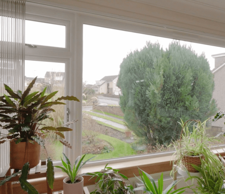 left view of large fixed pane window with side hinged casement window and top hinged casement hopper on the left. Window complete with royal oak timber sill