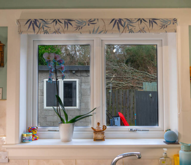 Internal shot of white casement windows in Kitchen complete with white sills and surrounds