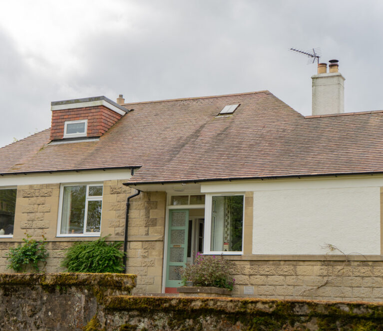 External full house view of Lorimer casement windows in Falkland home, from the front of the property.